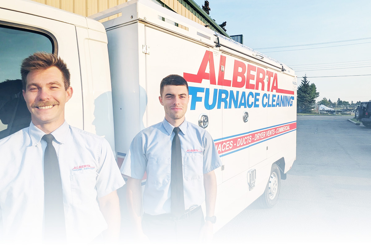 Alberta Furnace Cleaning Mobile Alberta Furnace Cleaning Technicians standing in front of a furnace and duct cleaning truck